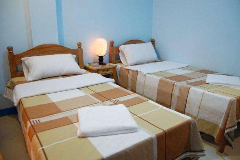 Balayong Pension Puerto Princesa Стая снимка